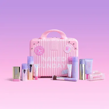First Class Jetsetter Beauty Bundle Kit - Mini Exclusive Pink or Lilac Suitcase plus Naked Sundays bestselling SPF and Skincare products  (SAVE 40%)
